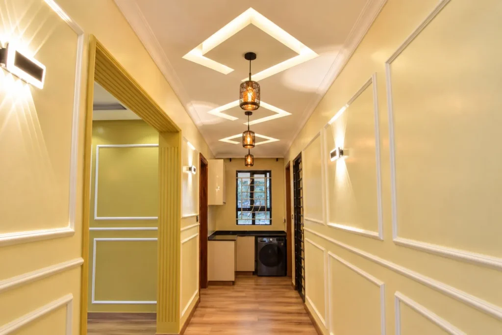 Corridor with wainscoting wall panels and gypsum ceiling, Kilimambogo, Machakos (1)